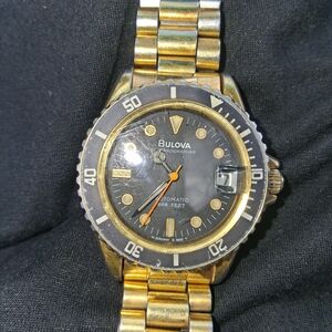 Bulova Gold and Black Chronograph Watch